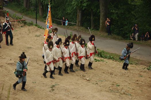SREBRNA GORA, POLAND - JUNE 11: 1807 Napoleon's forces battle reconstruction, siege of the Srebrna Gora fortress. French forces march on June 11, 2011.