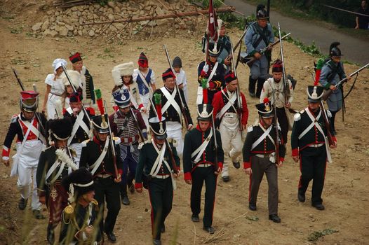 SREBRNA GORA, POLAND - JUNE 11: 1807 Napoleon's forces battle reconstruction, siege of the Srebrna Gora fortress. Soldiers setup positions on June 11, 2011.