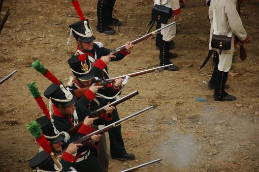 SREBRNA GORA, POLAND - JUNE 11: 1807 Napoleon's forces battle reconstruction, siege of the Srebrna Gora fortress. French musketeer shot on June 11, 2011.