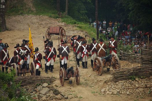 SREBRNA GORA, POLAND - JUNE 11: 1807 Napoleon's forces battle reconstruction, siege of the Srebrna Gora fortress. Cannons wait for orders on June 11, 2011.