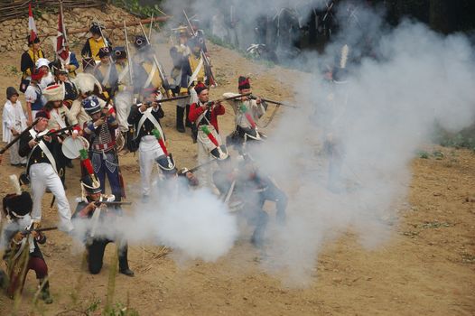 SREBRNA GORA, POLAND - JUNE 11: 1807 Napoleon's forces battle reconstruction, siege of the Srebrna Gora fortress. French side muskets fire on June 11, 2011.