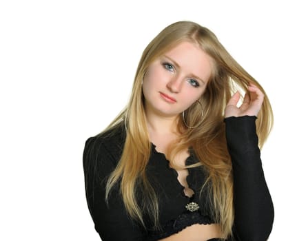 Portrait of the pretty young girl of the blonde. On a white background