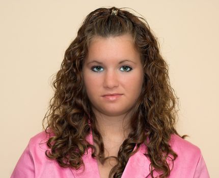 Head and shoulders portrait of a teenage girl. The girl has brown hair and is about eighteen years old.