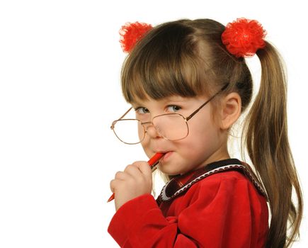 The little girl in big glasses and with pen. It is isolated on a white background