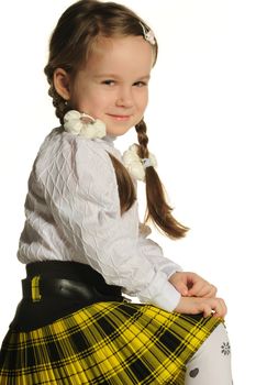 Portrait of the pretty little girl. It is isolated on a white background