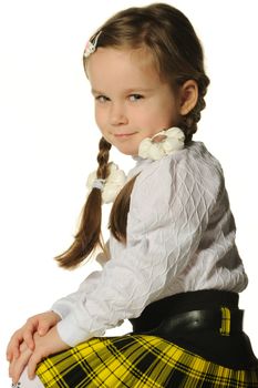 Portrait of the pretty little girl. It is isolated on a white background