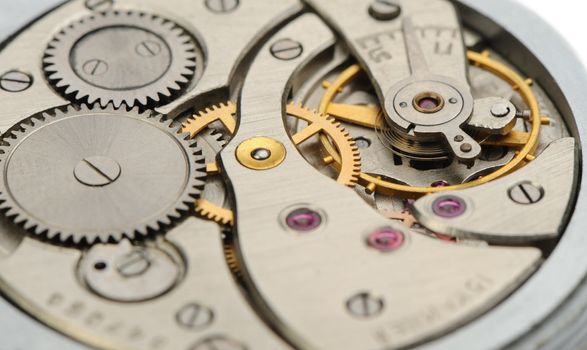 The mechanism of analog hours. A photo close up