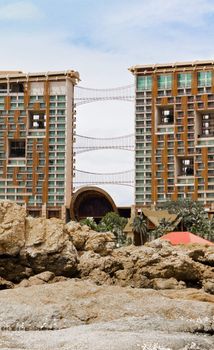 Beach, rocks, and hotels. Modern hotel. The eastern sea of ​​Thailand..