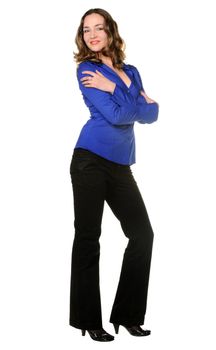 The attractive girl in trousers and dark blue shirt. It is isolated on a white background