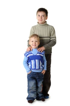 Two brothers. Age of 3 and 7 years. It is isolated on a white background