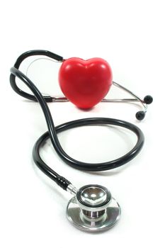 Stethoscope with red heart on a white background