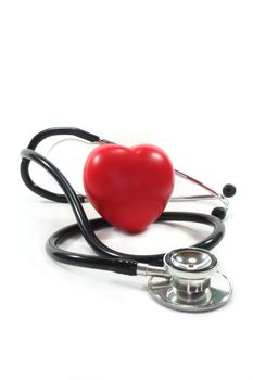 Stethoscope with red heart on a white background