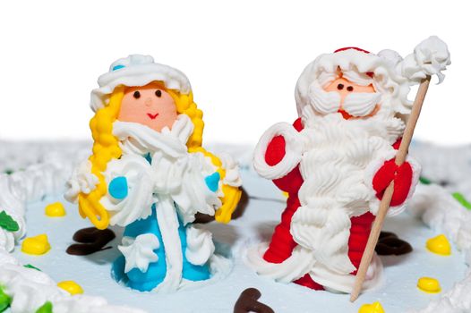 New Year's cake. Decorated the Snow Maiden and Santa on hours.