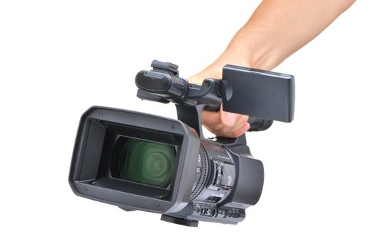 Videocamera in a hand. It is isolated on a white background