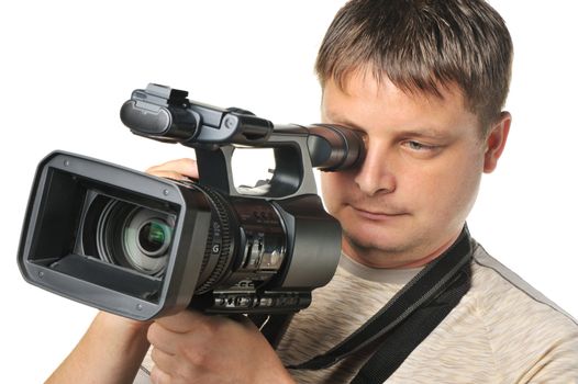 The man with a videocamera. It is isolated on a white background