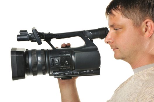 The man with a videocamera. It is isolated on a white background