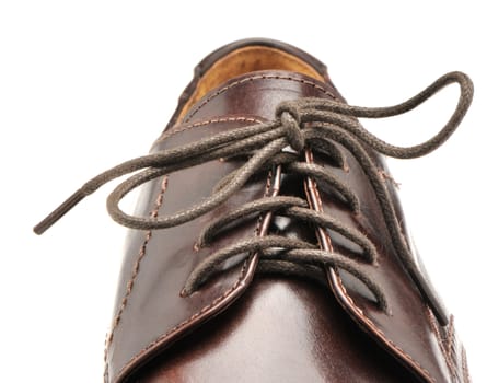 Man's shoes from a brown leather. A photo close up