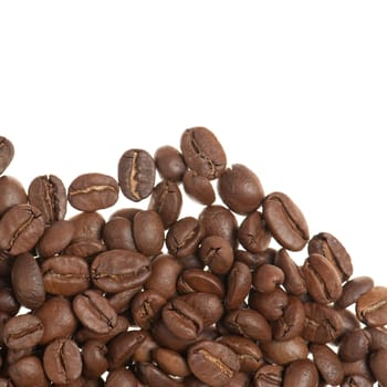 Heap of grains of coffee. It is isolated on a white background