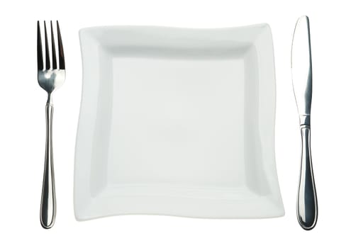 Plate, knife and fork. Kitchen utensils isolated on a white background