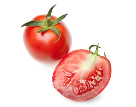The cut tomatoes. It is isolated on a white background