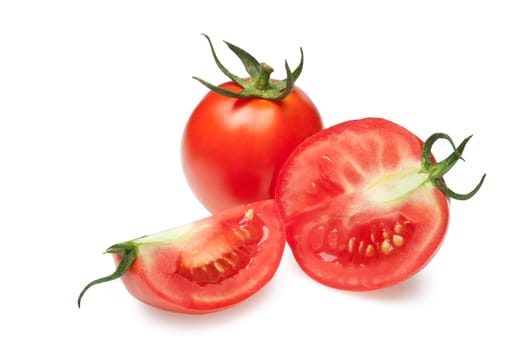 The cut tomatoes. It is isolated on a white background