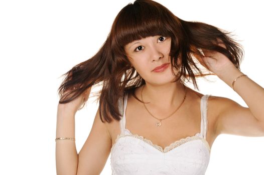The beautiful girl on a white background. The Asian nationality