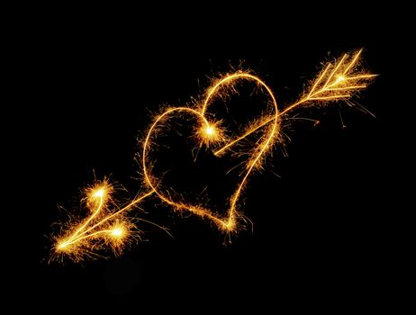 Heart from sparks. It is isolated on a black background