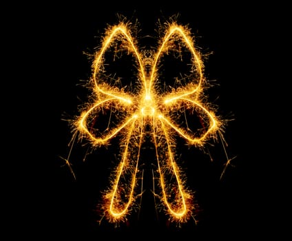 The bow from bengal fires. Abstract the image of an bow sparks of fire