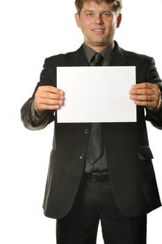 Young the man holds blank signs. It is isolated on a white background