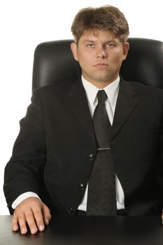 The young businessman in bad mood. A portrait of the man it is isolated on a white background.