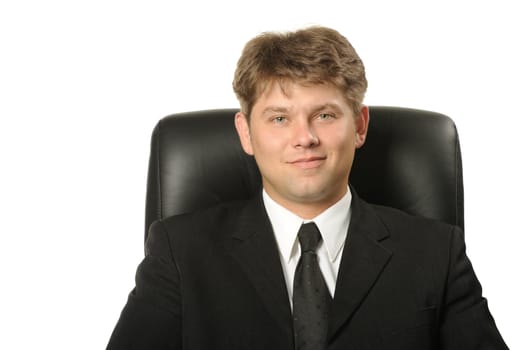 The young businessman isolated on a white background. A portrait of the man.