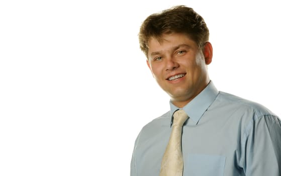 The young businessman isolated on a white background. A portrait of the man.