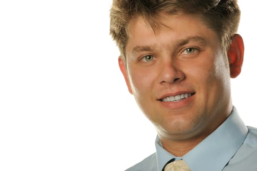 The young businessman isolated on a white background. A portrait of the man.