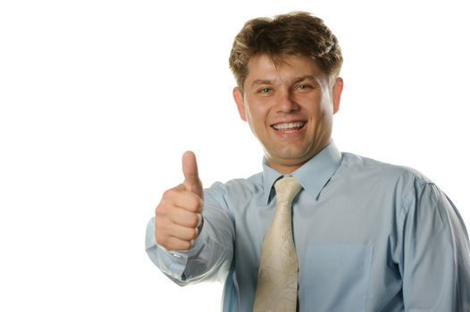 The young businessman with approving gesture. With the lifted greater finger of a hand. It is isolated on a white background