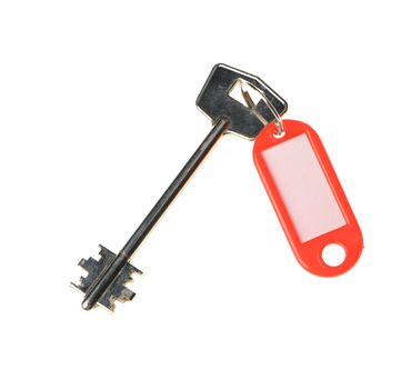 Key with color trinket . In trinket  a white empty label for records