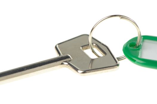 Key with color trinket . In trinket  a white empty label for records