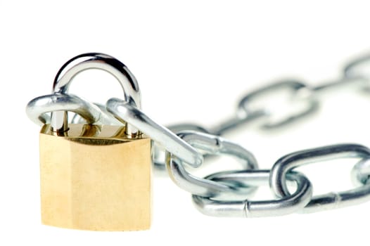 The lock with chain. The lock of gold color closing chain