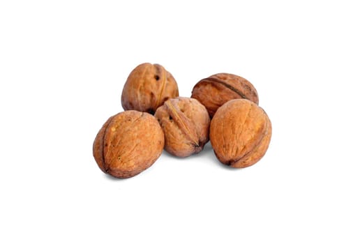 few walnuts, a group located on a white background