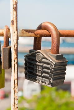 Old padlock. Iron, rusty lock on blur a background