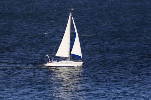 sailing boat in waters in a gulf of silent ocean of San Francisco