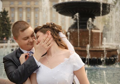 Newly-married couple. Pair young men in wedding day