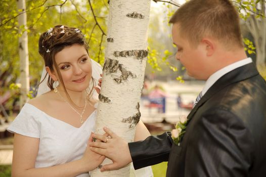 Newly-married couple. Pair young men in wedding day