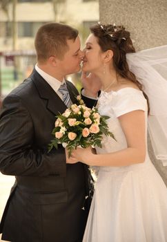 Newly-married couple. Pair young men in wedding day