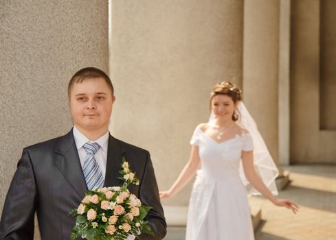 Newly-married couple. Pair young men in wedding day