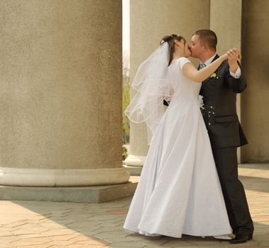 Newly-married couple. Pair young men in wedding day