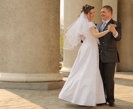 Newly-married couple. Pair young men in wedding day