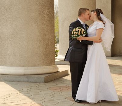 Newly-married couple. Pair young men in wedding day