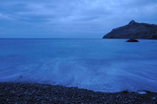 The night sea. The sea photographed at a dawn with long endurance. Crimea, Ukraine