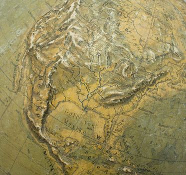 Part of old antique globe showing a map over North America