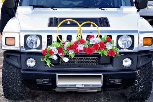 White off-highway car as wedding limousine